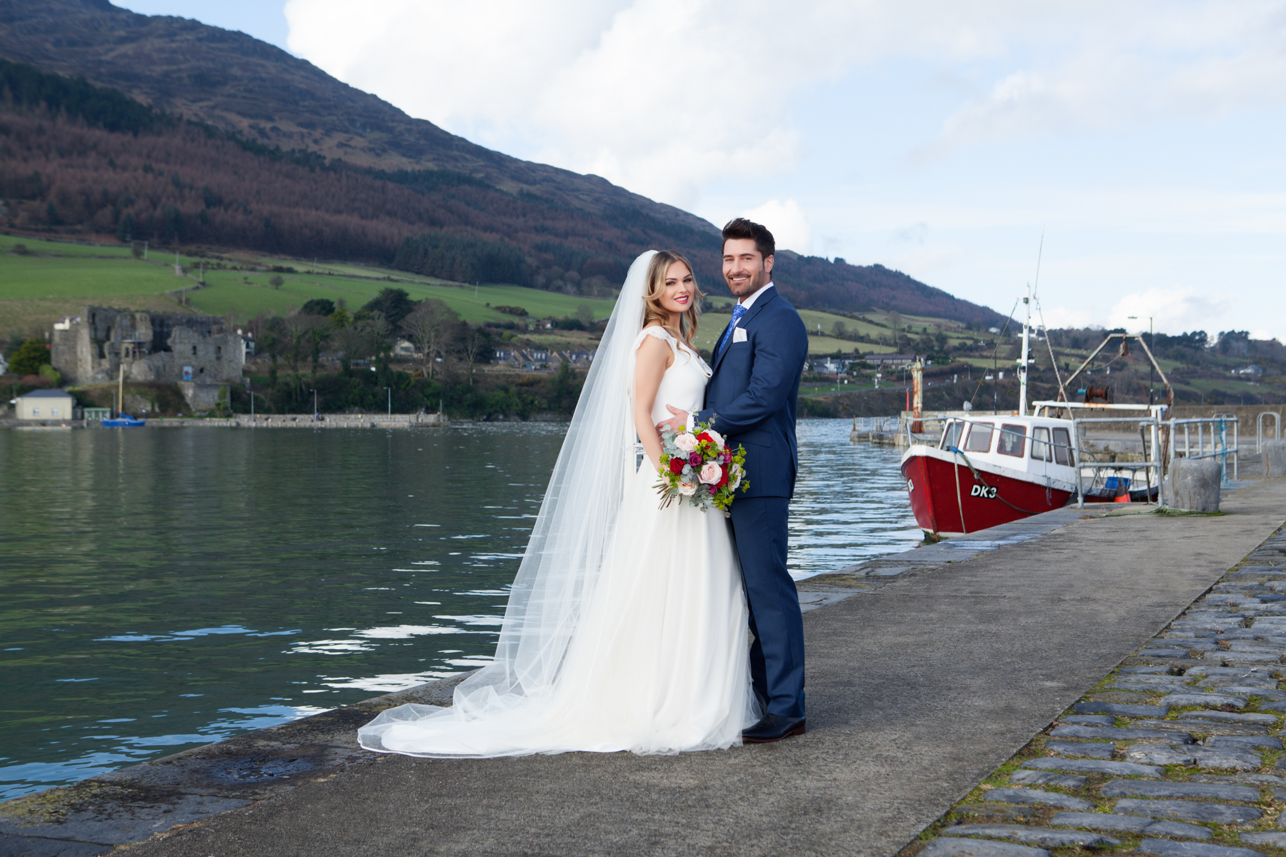 Wedding couple from the Four Seasons Hotel Carlingford on the quayside at Carlingford